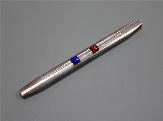 A white metal and enamel mounted double ended propelling pen/pencil, 17.8cm.